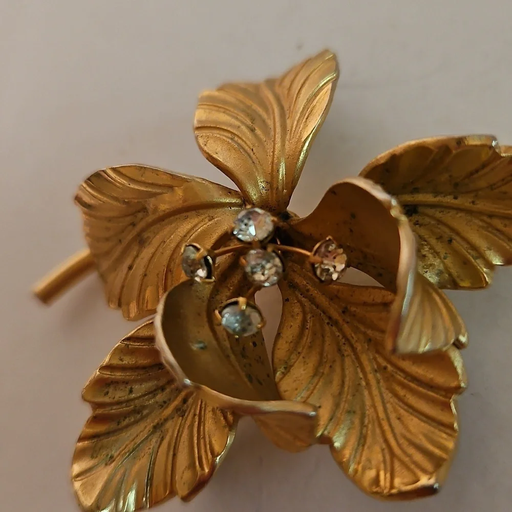 Elegant Rhinestone & Goldtone Floral Brooch